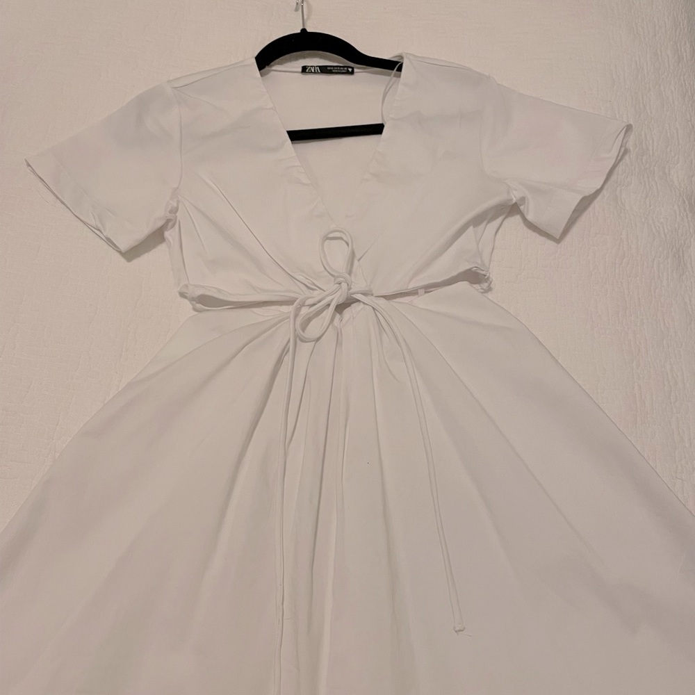 White dress with cut outs